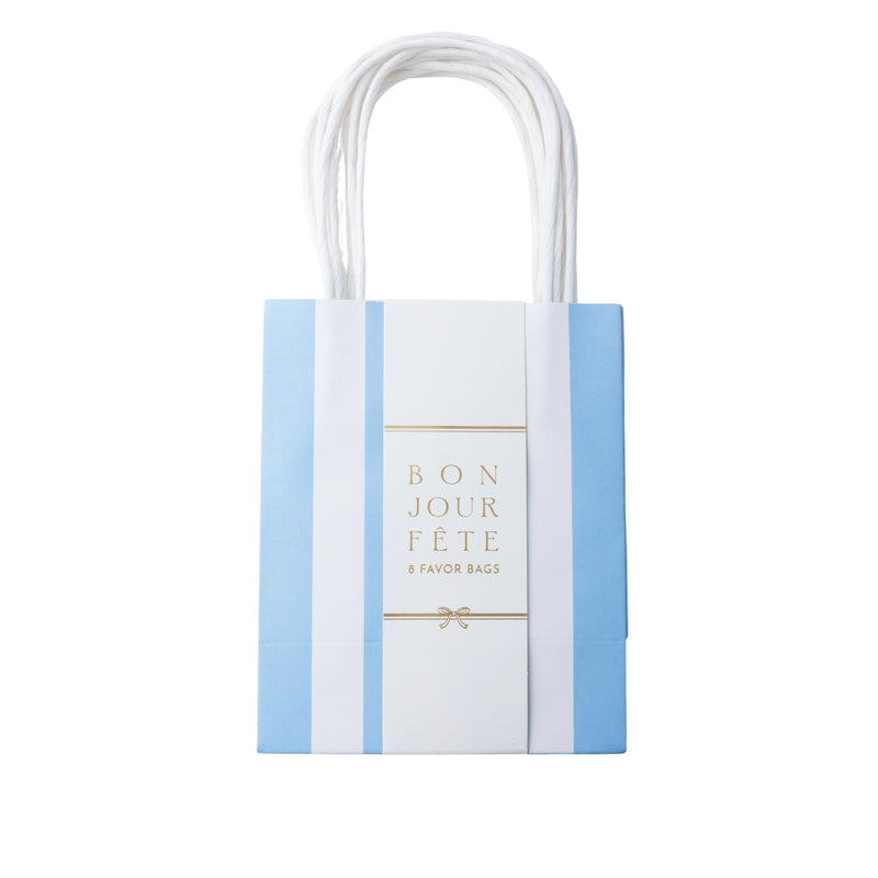 Sky blue cabana stripe paper favor bag with a center label and handles