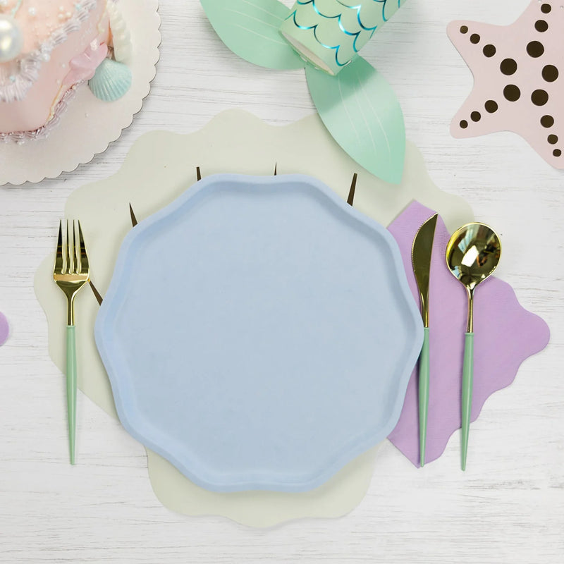 Sky blue compostable dinner plate with gold flatware and mermaid accents.