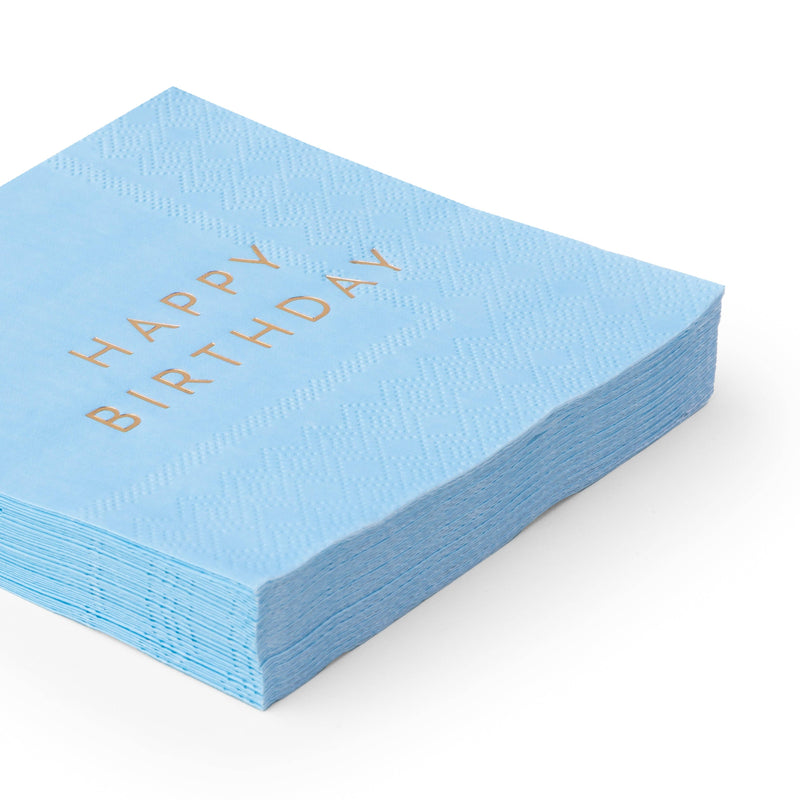 Stack of sky blue cocktail napkins with gold foil Happy Birthday lettering, angled product view
