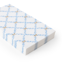 Stack of Sky Blue Trellis Guest Towels shown from side angle.