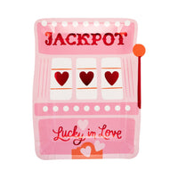 Pink and red slot machine–shaped plate with “Jackpot” and heart reels.