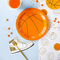 Sneaker napkin next to basketball plates—easy nike party decorations vibe.