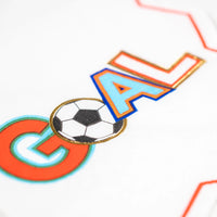 Close detail of GOAL lettering with soccer ball O and foil outline