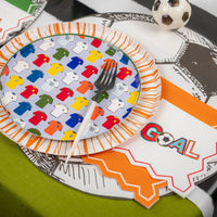 Tablescape with jersey plates and GOAL napkin at place setting