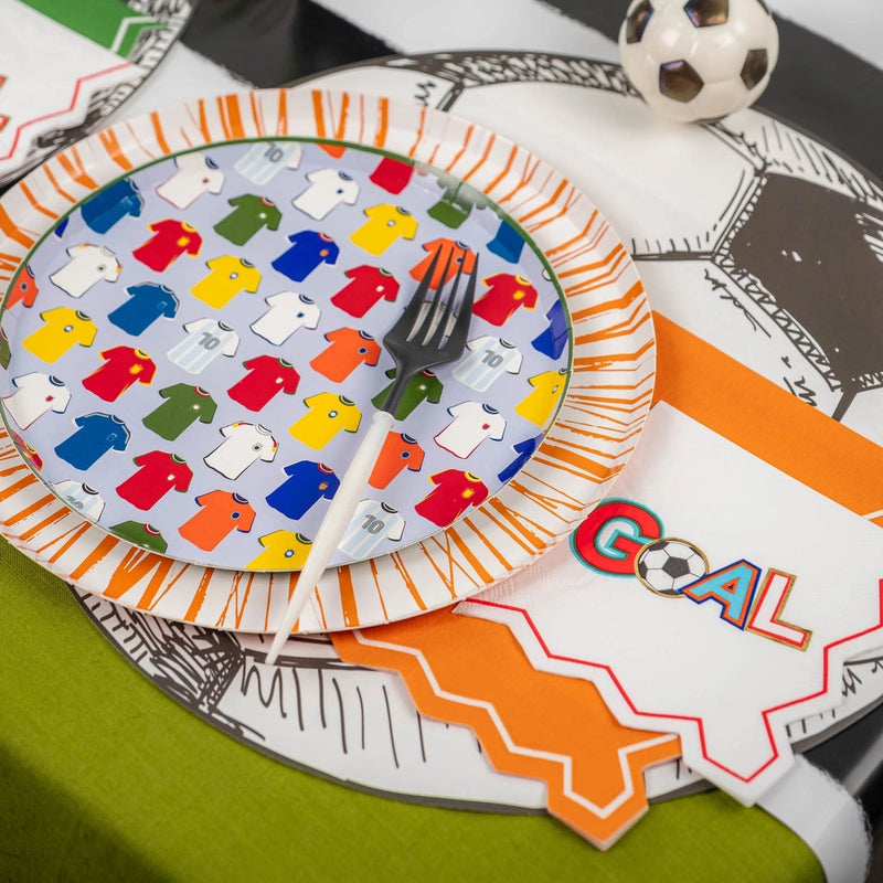 Tablescape with jersey plates and GOAL napkin at place setting