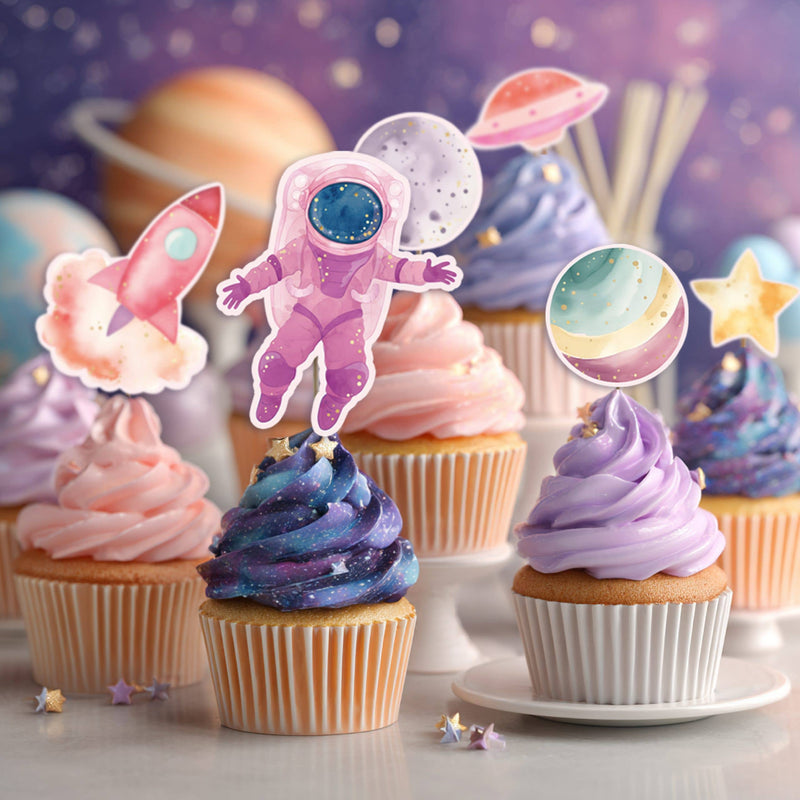 space themed cupcakes with astronaut and planet toppers on galaxy frosting