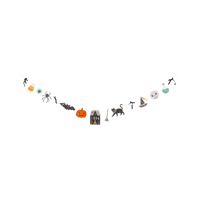 Full character paper banner on white background, hung in a natural drape. All 11 die-cut paper pieces visible left to right: candy corn, blue-green eyeball, black spider, black bat, orange jack-o-lantern, black haunted house with gray roof, broom with orange bristles, black cat with teal collar, dancing figure in party hat, gray skull, and green potion bottle. Cream twine connects all pieces. Black velvet ribbon bows tied between several characters.