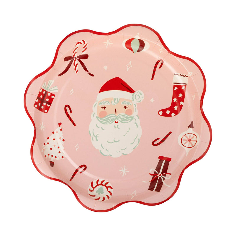 Pink scalloped plate with Santa and Christmas icons