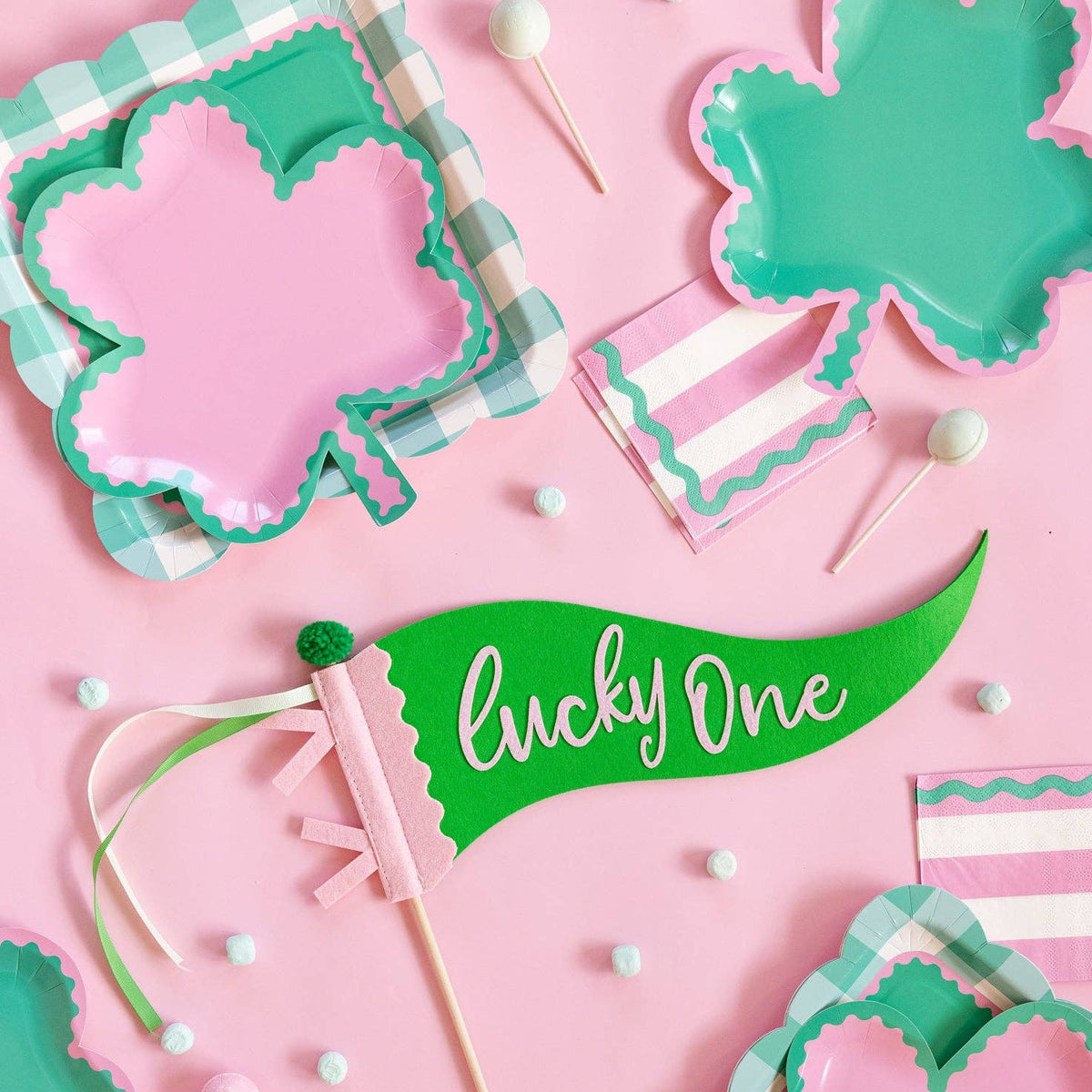 Pink and green gingham plates styled for St Patrick’s Day table setting