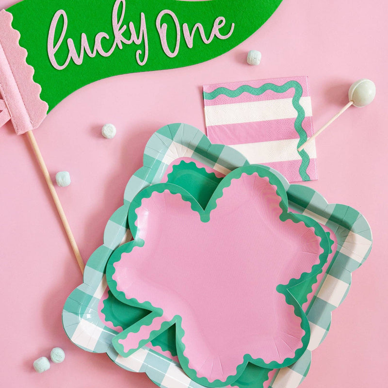 Pink and green gingham plates styled for St Patrick’s Day table setting