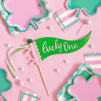 Pink and green St Patrick’s Day cocktail napkins styled on party table