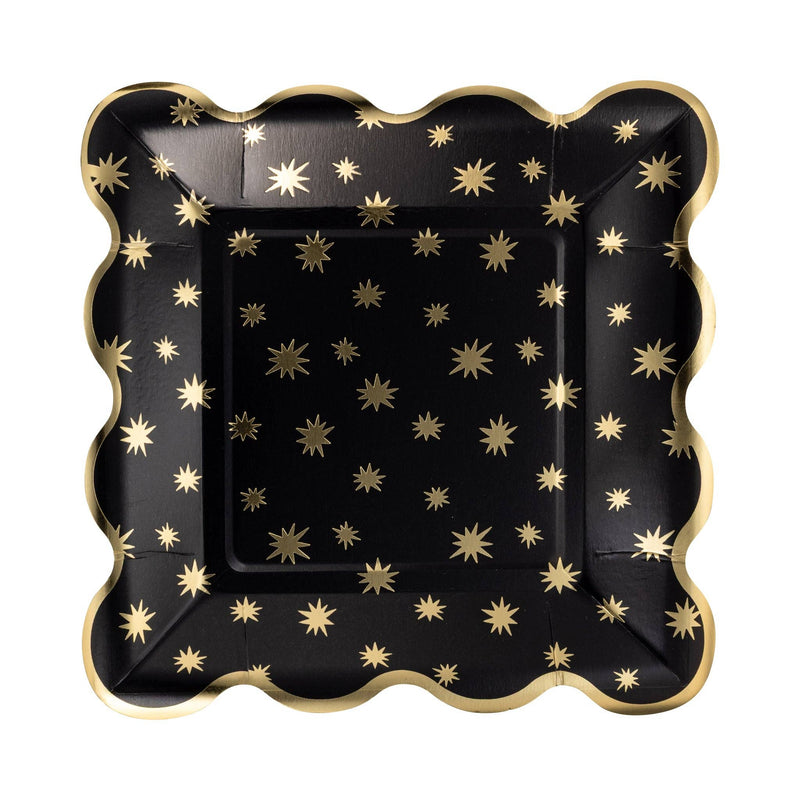 Black square paper plate with gold star pattern and scalloped edges