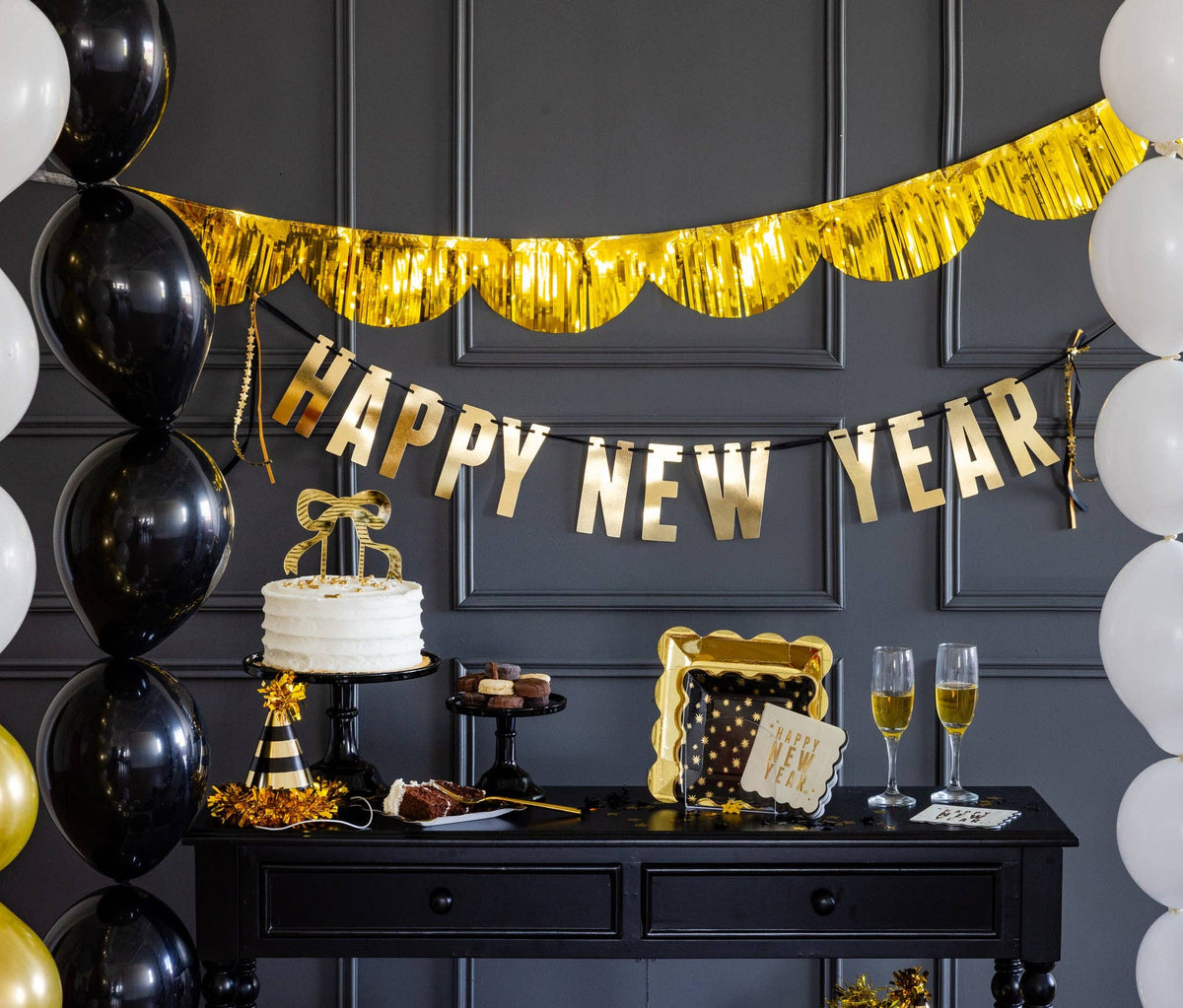 New Year’s Eve party table featuring Star Pattern Plate and gold décor