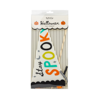 Front of the retail package: a scalloped cream header reading "Halloween • Felt Pennant" flanked by jack-o-lantern icons, with the folded "Stay Spooky" felt pennant and wood dowel visible through the window over a black pinstripe backer. Straight-on packaging shot.