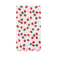 Single Strawberry Paper Guest Towel unfolded on white background showing the all-over strawberry print with red strawberries, green leafy stems, tiny pink polka dots on cream, and the pink scalloped bottom edge
