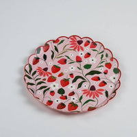 Isolated product shot of an 8.5-inch Strawberry Paper Plate showing the red scalloped edge and illustrated blossoms.