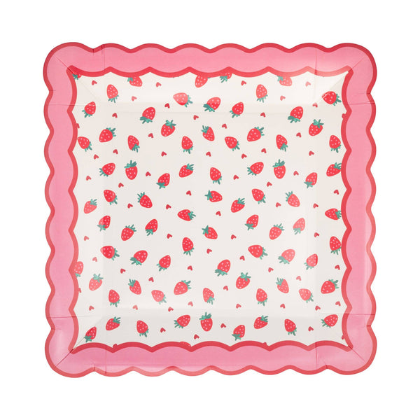Square scalloped paper plate with pink border and strawberry and heart pattern design.
