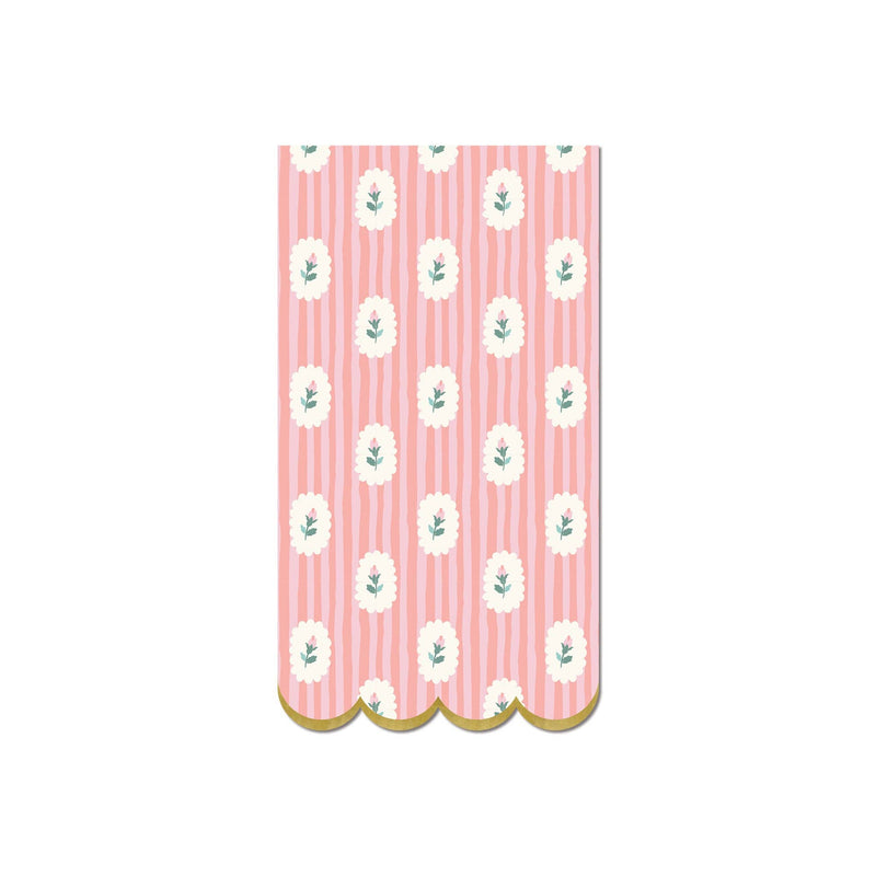 Pink striped floral paper dinner napkin with scalloped gold edge on white background