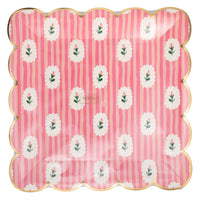 Packaged striped floral pink paper plates showing full design