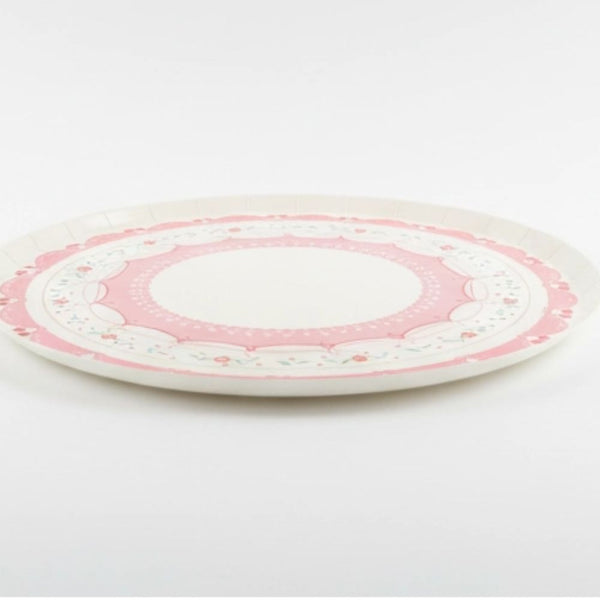 Side view of a flat cherry cake plate showing sturdy paper construction