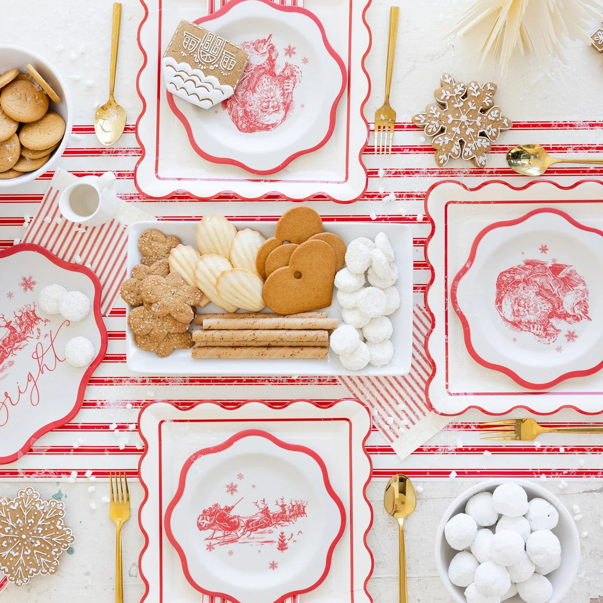 Overhead view of a dessert table set with the layered vintage Christmas paper plates and holiday cookies.