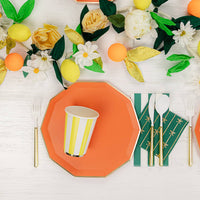 Lemon and floral tablescape with Sunkissed Orange plate and striped yellow cup