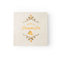 Single cocktail napkin with gold-foil pie slice and “Sweet as Pumpkin Pie” lettering, front view.