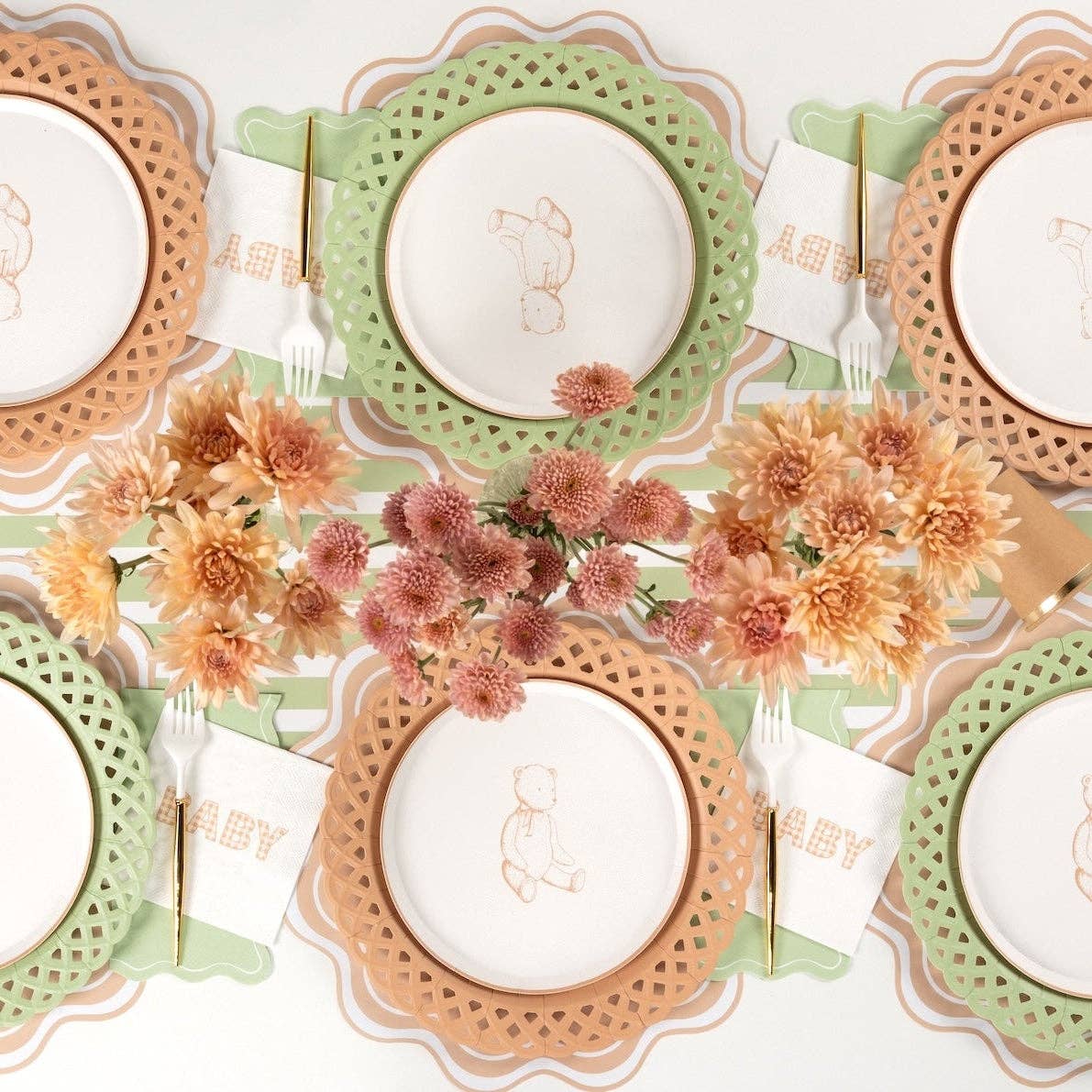 Overhead neutral baby shower tablescape with tan gingham BABY napkins at six place settings and autumn florals