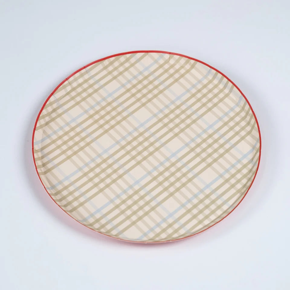 Tan plaid paper dinner plate with a red rim, angled on a white background.