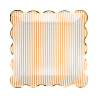 Tan striped square paper plate with scalloped edges on white background