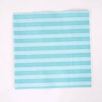 Single teal cabana stripe paper lunch napkin flat on white