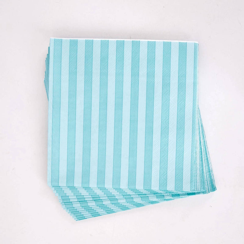 Stack of folded teal striped paper lunch napkins