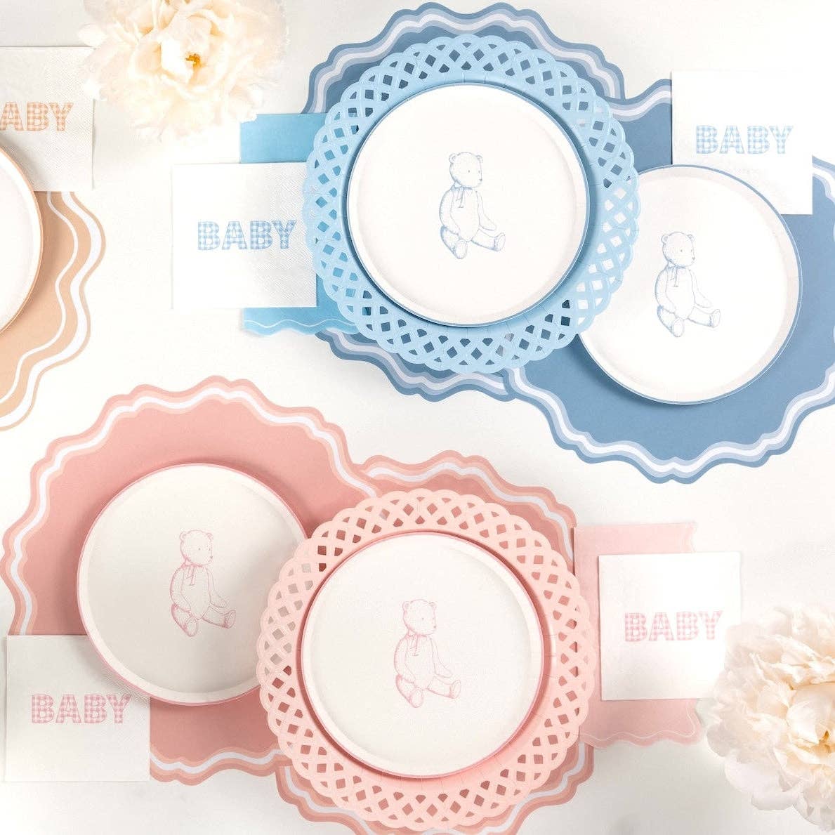 Pink and blue teddy bear plates arranged together with pink and blue gingham BABY napkins