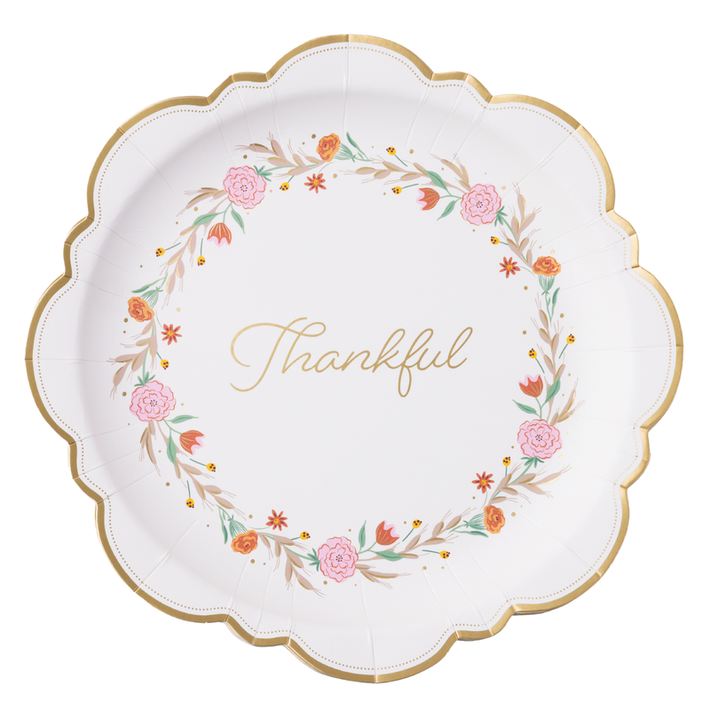 White Thanksgiving dinner plate with a fall floral wreath, Thankful in gold script, and a gold scalloped rim