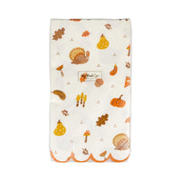 Pack of 24 guest-towel dinner napkins with Thanksgiving icons and scalloped orange edge.