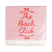 A pack of pink Bach Club party supplies napkins with red script and bow graphics.