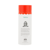Tinsel Tavern puzzle tube styled with other holiday puzzles among greenery and gift boxes