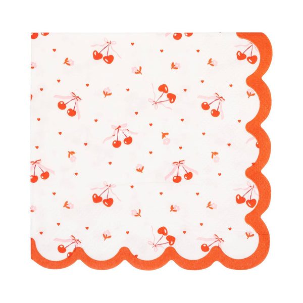 Cocktail napkin with red scalloped edge and tossed cherry pattern