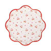 scalloped plate with tossed cherry pattern and red scalloped border
