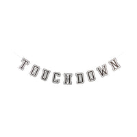 Black and cream touchdown banner with stitched paper letters spelling touchdown