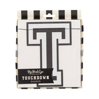 Touchdown banner packaging showing black and cream football party decoration