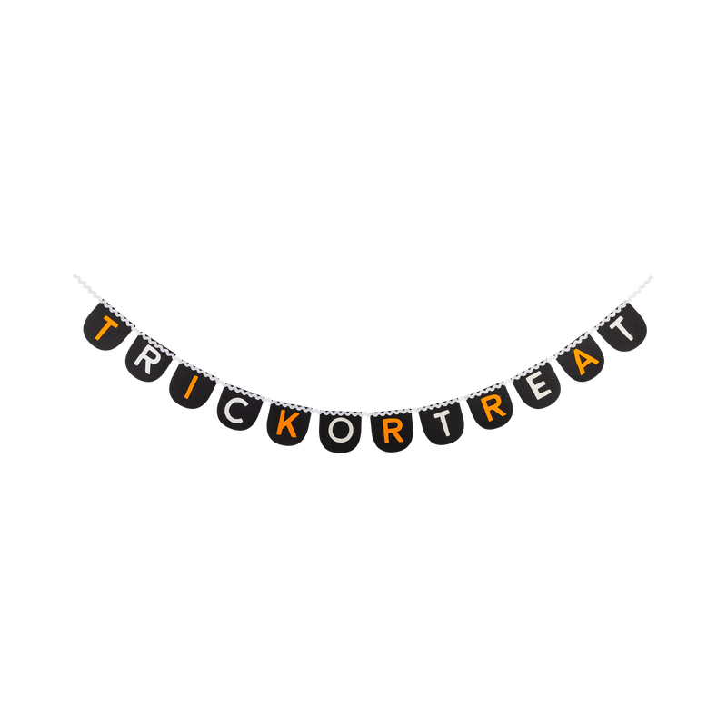 Full "Trick or Treat" felt banner on white background, hung in a natural drape. All 12 black felt flags visible, each with a single letter in alternating orange and cream. Cream rickrack ribbon connects all pieces along the top edge. The banner reads T-R-I-C-K-O-R-T-R-E-A-T left to right with consistent spacing.