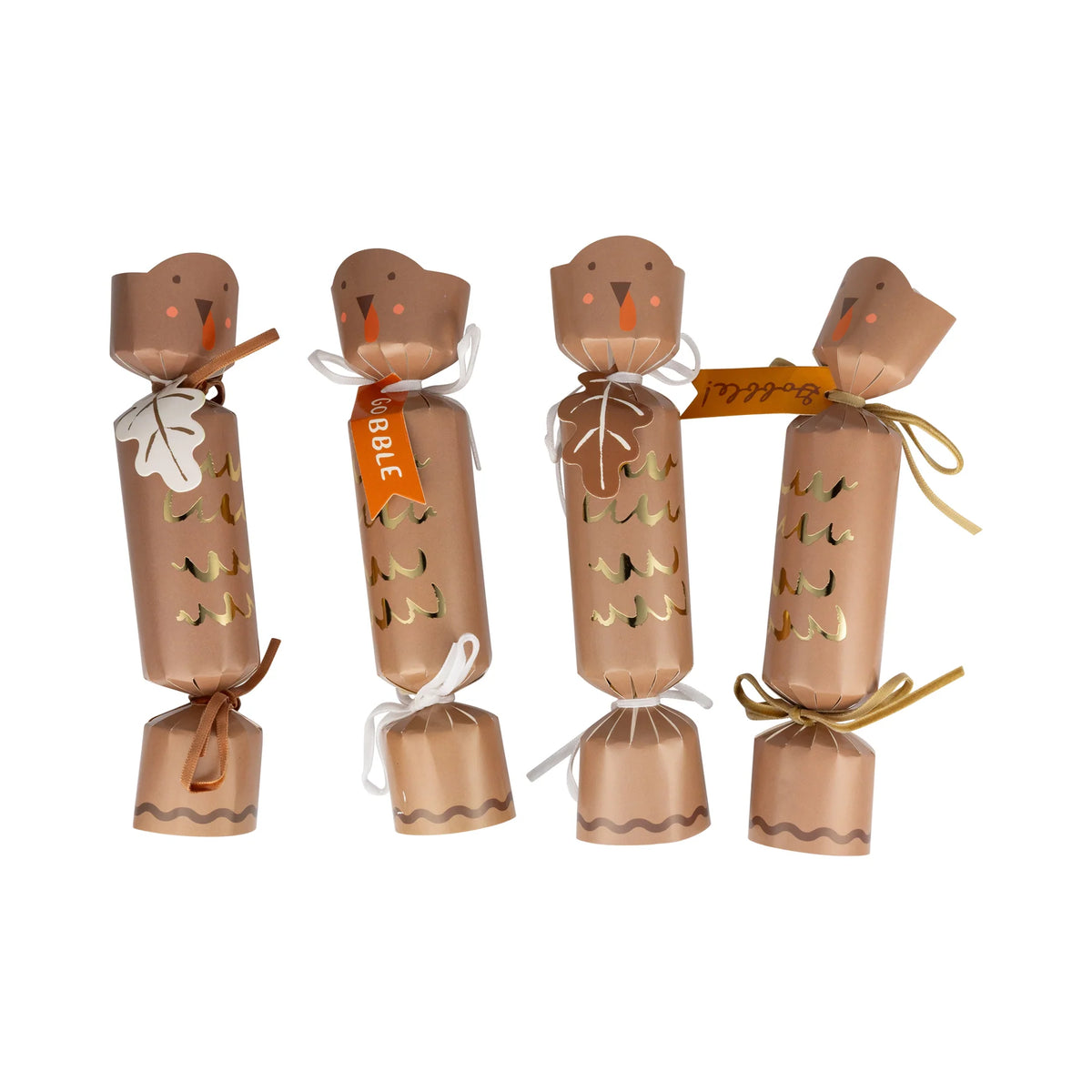 Four assembled turkey crackers with ribbon ties and gift tags.