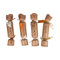 Four assembled turkey crackers with ribbon ties and gift tags.