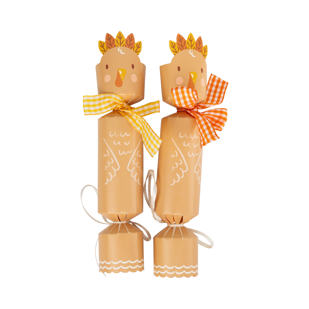 Two festive turkey party cracker tied with gingham ribbon on a white background.
