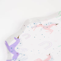Close detail of holographic mane on pastel unicorn with mini rainbows.