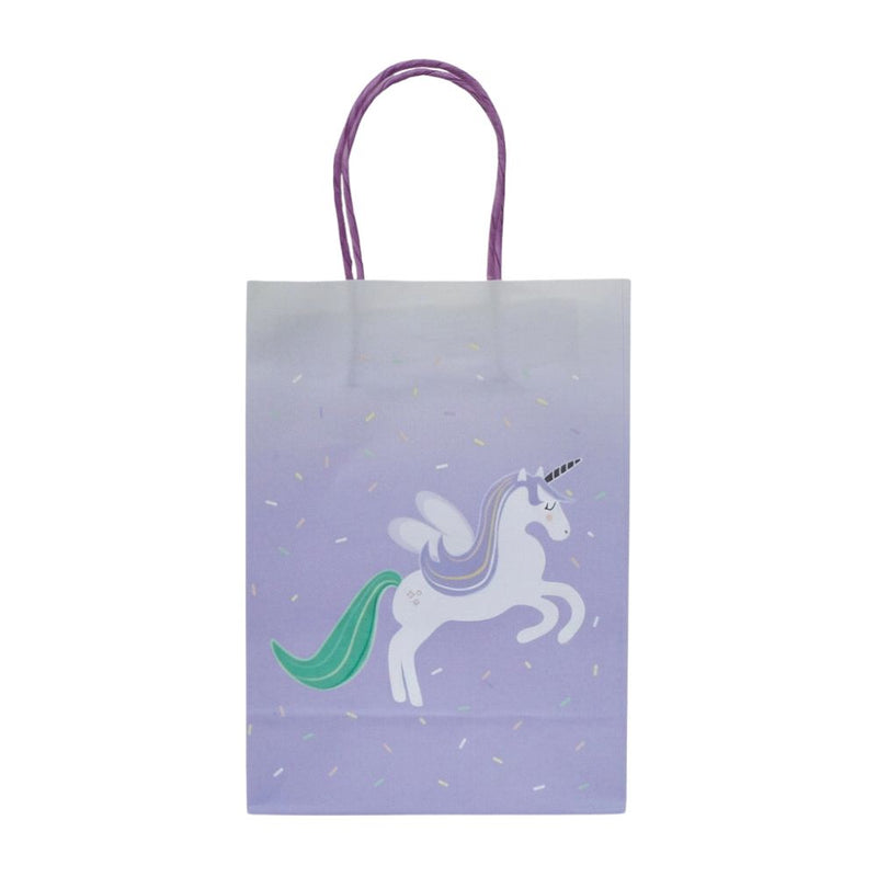 Front view of a purple ombre unicorn favor bag with purple handles