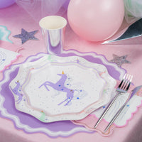 Lavender unicorn plate with silver cup and rainbow napkin—easy unicorn party napkins styling.