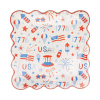 Front view of USA icons scalloped paper plate in packaging showing all-over red white and blue print with flags fireworks stars and 1776