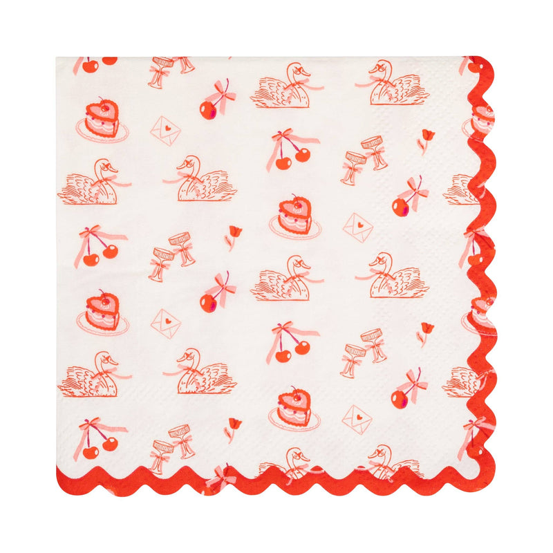 This image shows a cream cocktail napkin with red scalloped edges and small Valentine illustrations including swans, cherries, cake, and envelopes.
